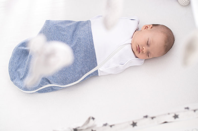 Baby schlafend im Träumeland Pucksack Baby schlafend im Träumeland Pucksack