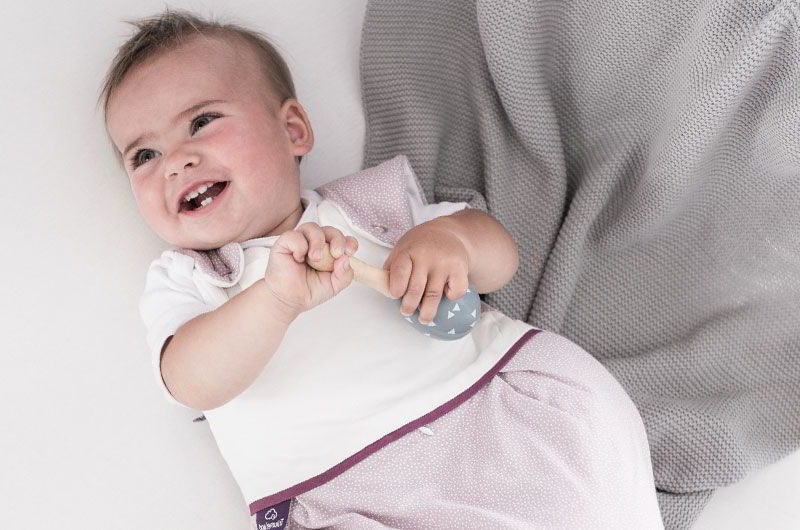 Lachendes Baby im Träumeland Schlafsack Lachendes Baby im Träumeland Schlafsack
