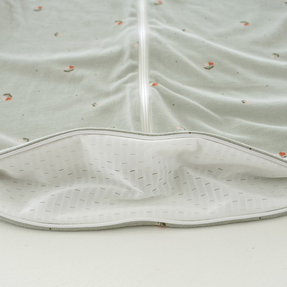Sommerschlafsack Fiore Grün aus Tencel™ Detail Belüftungsschlitz unten