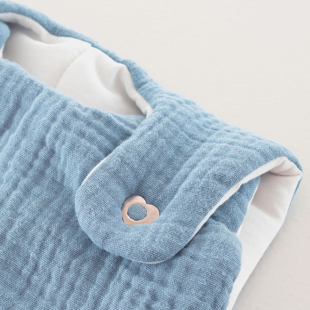 All-year sleeping bag in cotton muslin light blue press stud