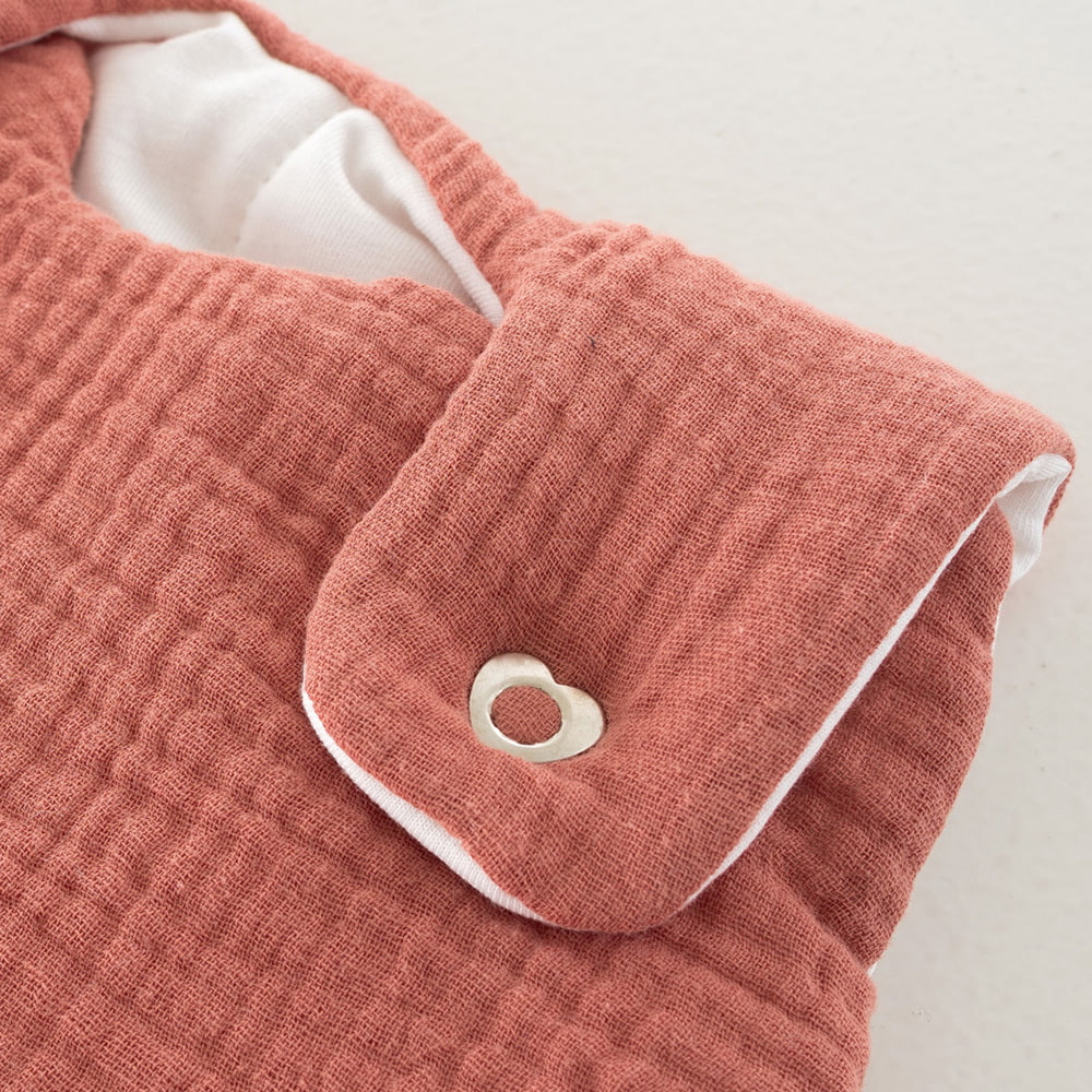 All-year sleeping bag in cotton muslin apricot press stud