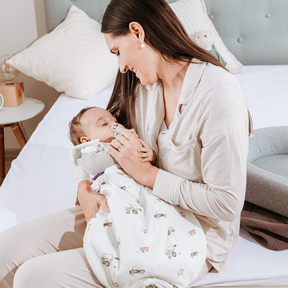 Lifestyle picture of a sleeping bag with baby