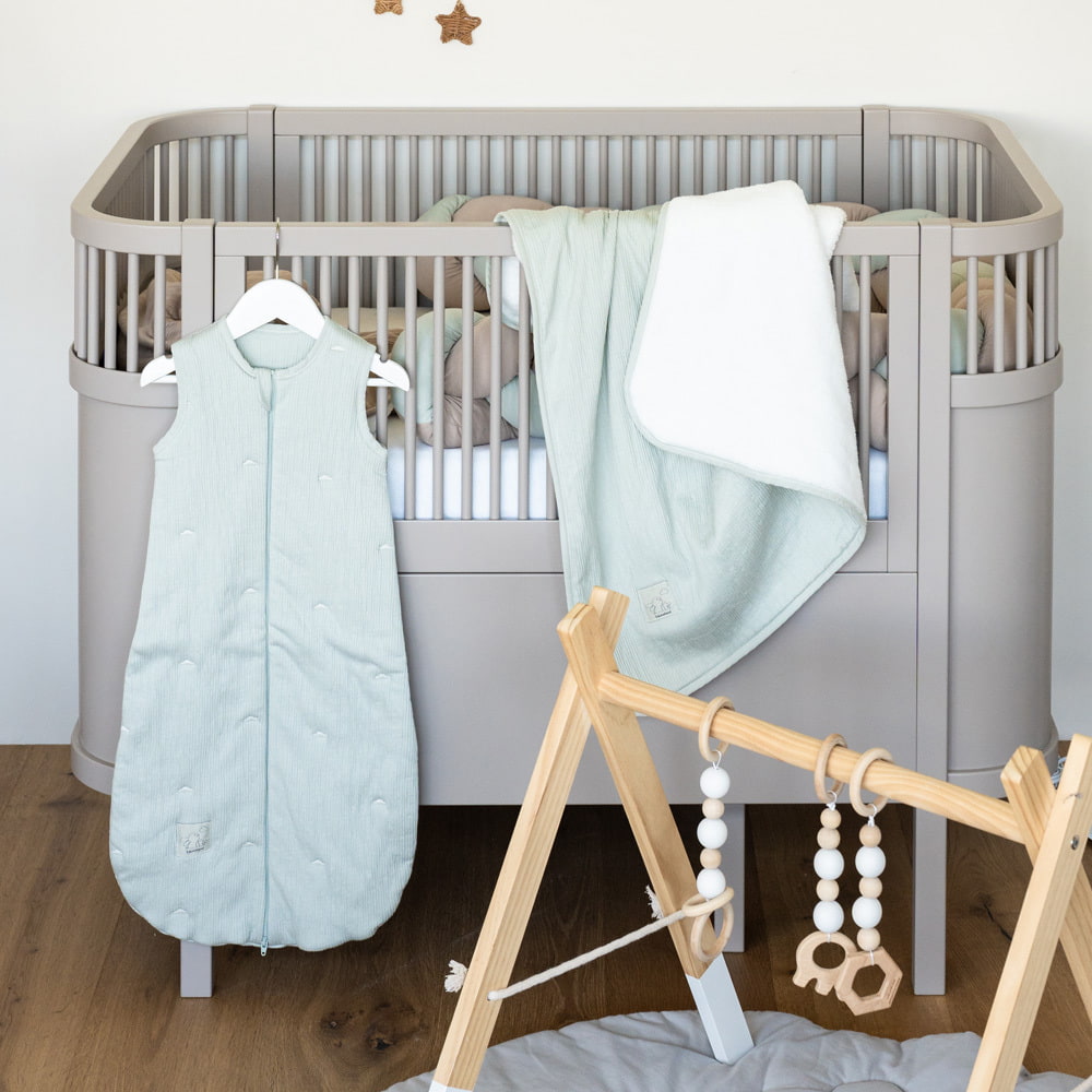 Kinderzimmer mit Schlafsack und Kuscheldecke der Signature Collection