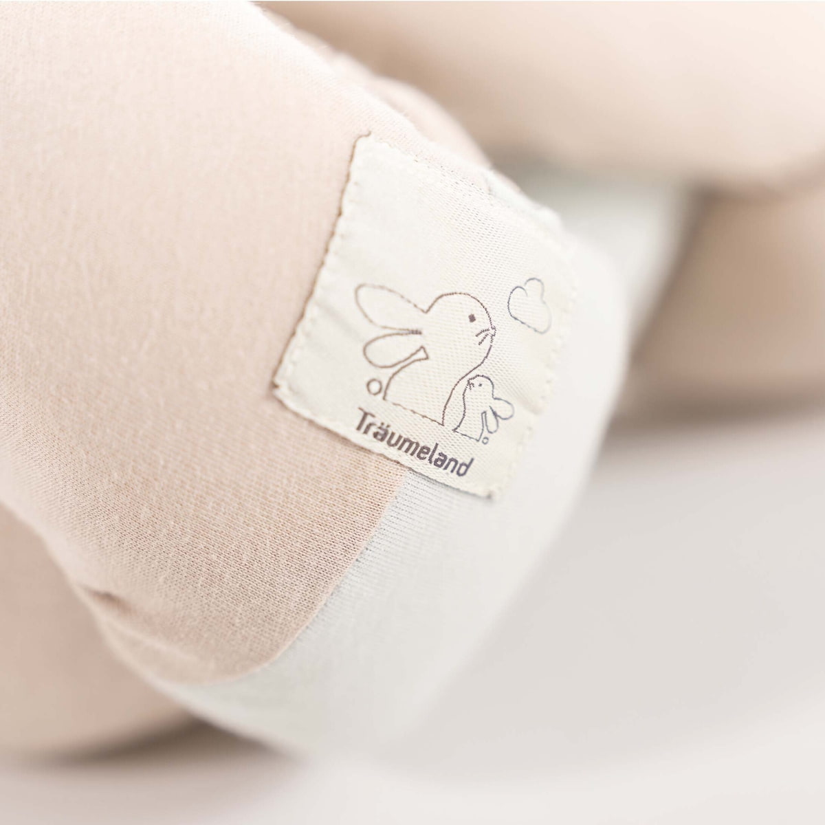 Signature Nestchenschlange taupe & mint Detail Hasenaufnäher