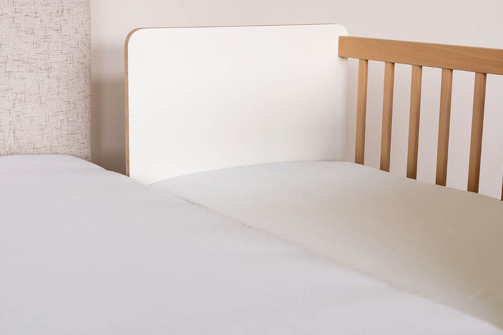 Extra bed next to the parents’ bed